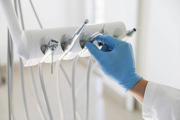 Professional Root Canal Treatment technician working in Lamont, MI